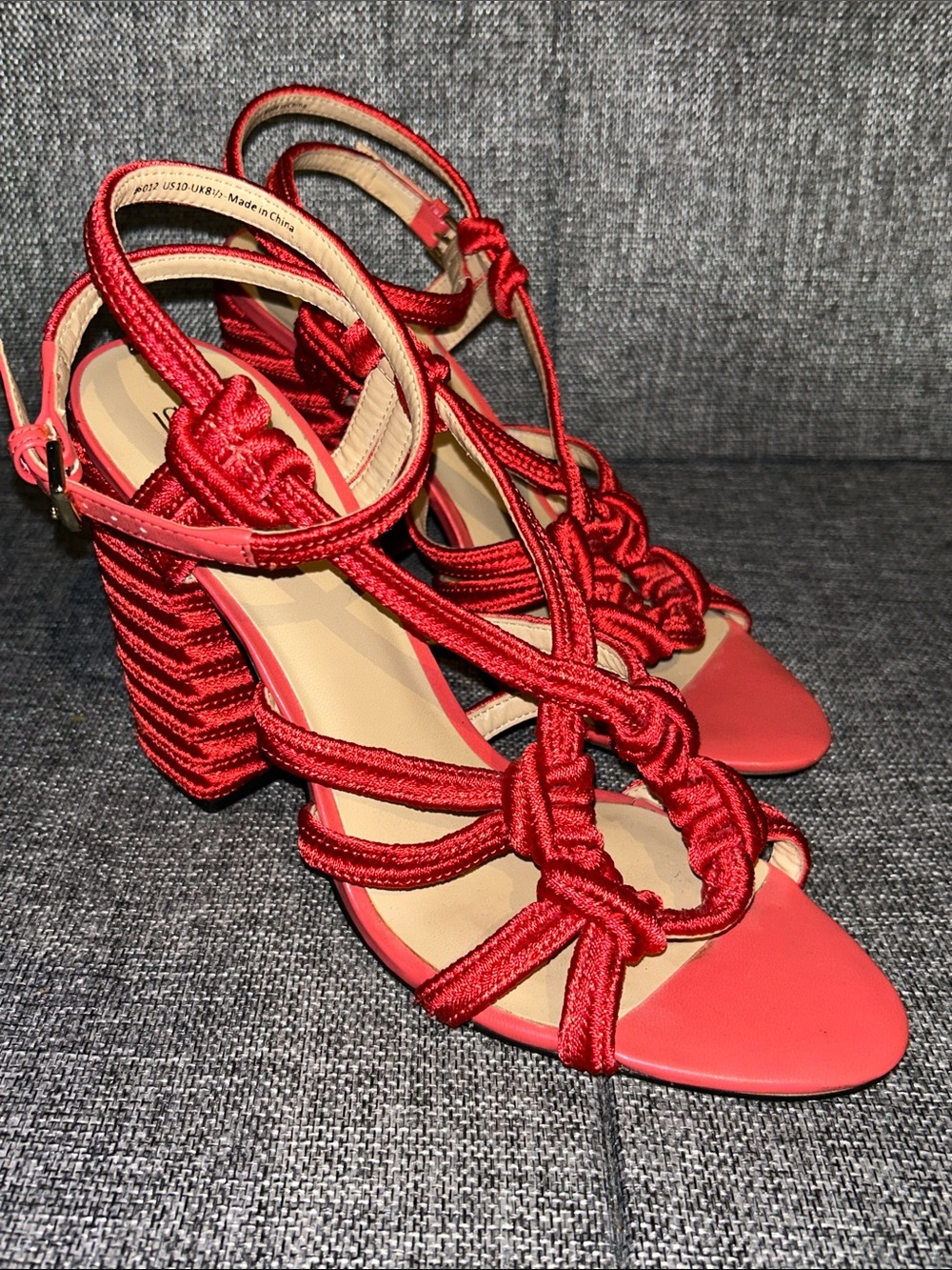 Cabi TIPTOE Sandal in a bright hibiscus red/coral color